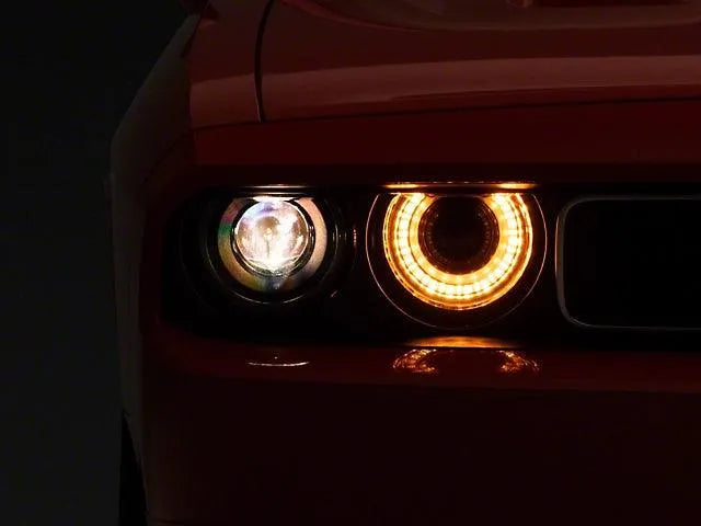 Raxiom 08-14 Dodge Challenger Halo Projctr Headlights w/Sequential Turn Signals-Blk Hsng(Clear Lens)