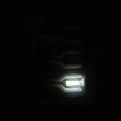 AlphaRex 19-23 Dodge Ram 1500 Luxx-Series LED Tail Lights Black/Red w/Activ Light/Seq Signal