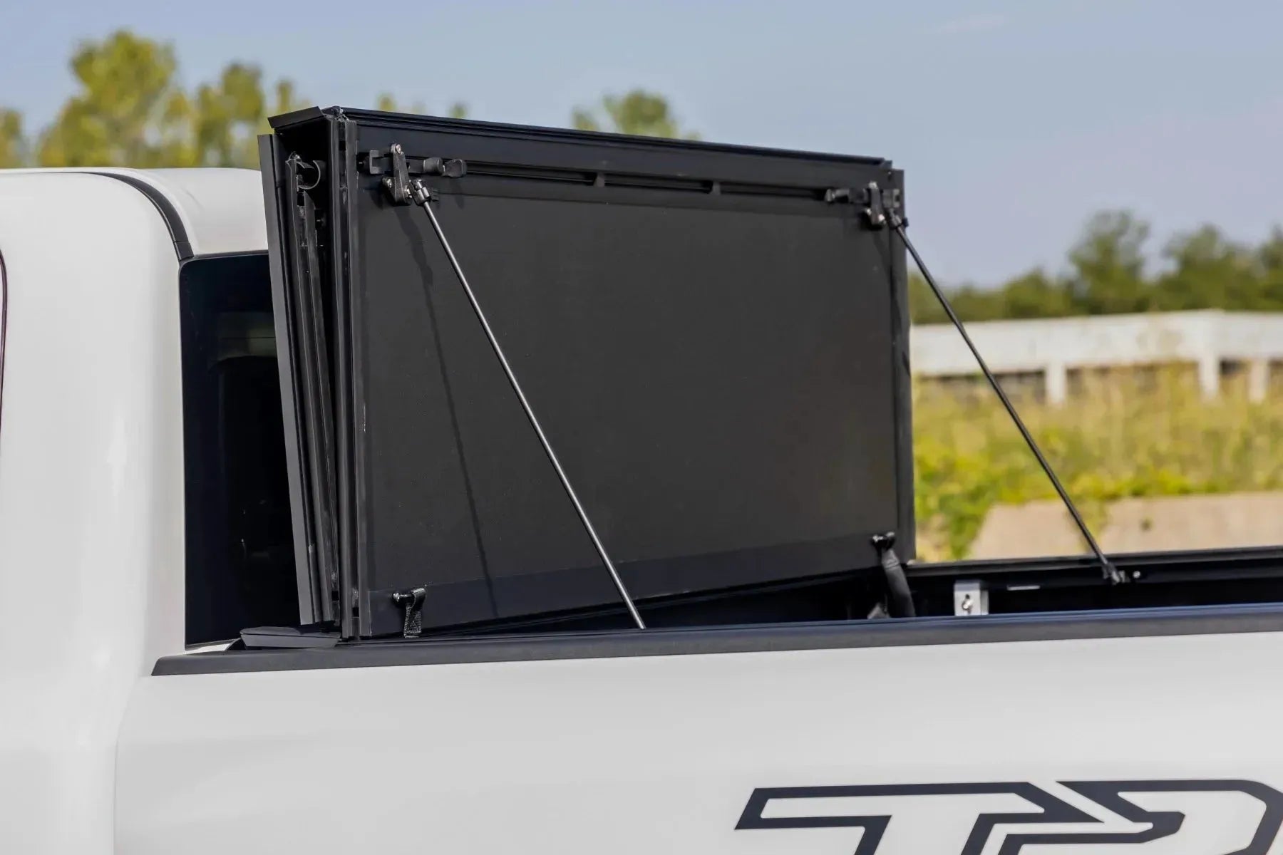 Rough Country Hard Tri-Fold Flip Up Bed Cover 2019-2027 Ram 1500, RHO & TRX