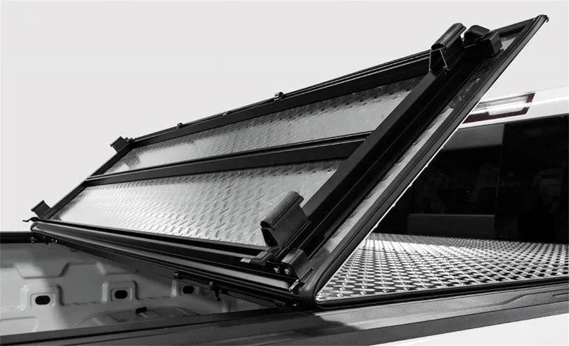 Access LOMAX Tri-Fold Cover Black Urethane Split Rail 19+ Ram 1500(new body) - 6ft 4in Bed (w/o RamBox)